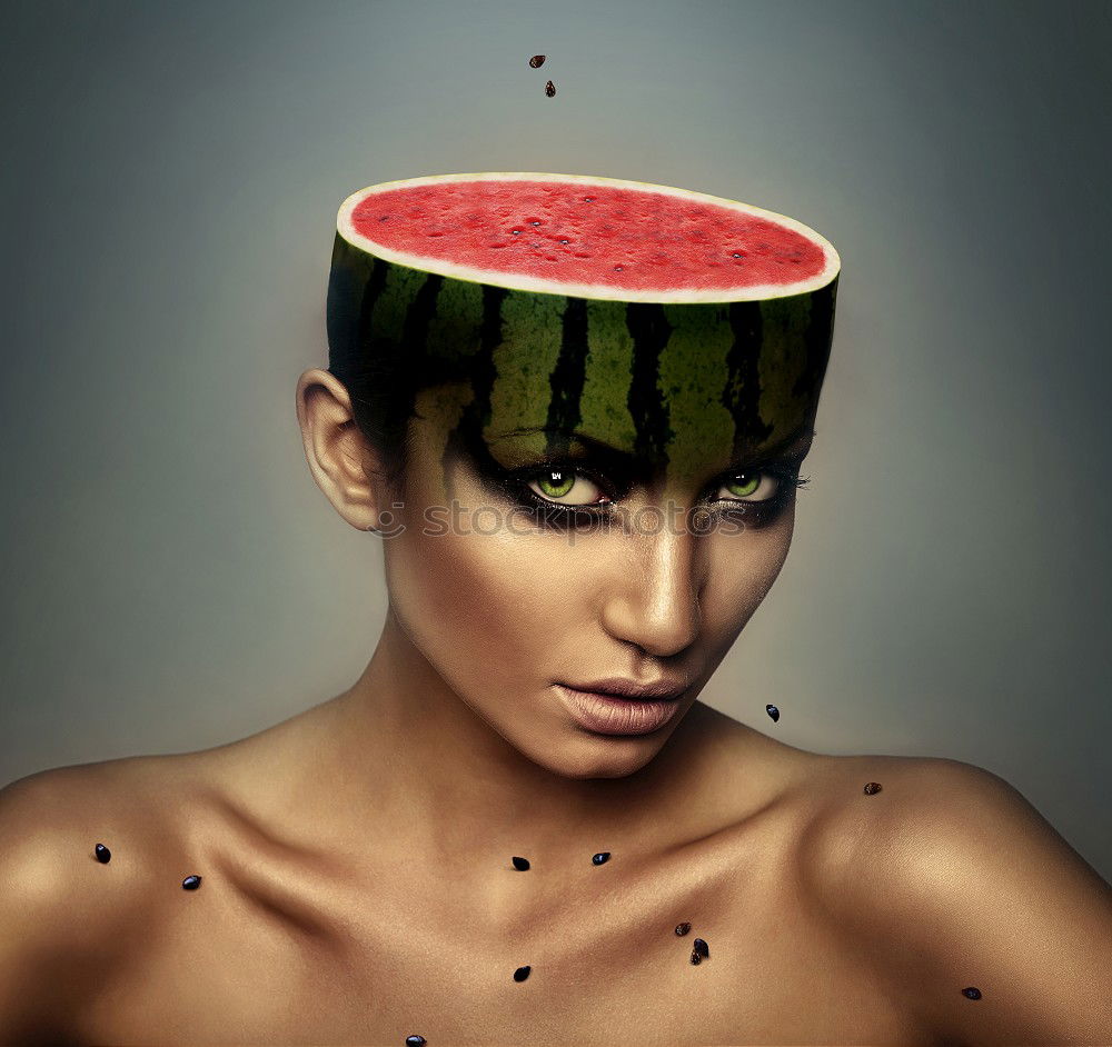 Similar – Not so young woman finally biting in watermelon