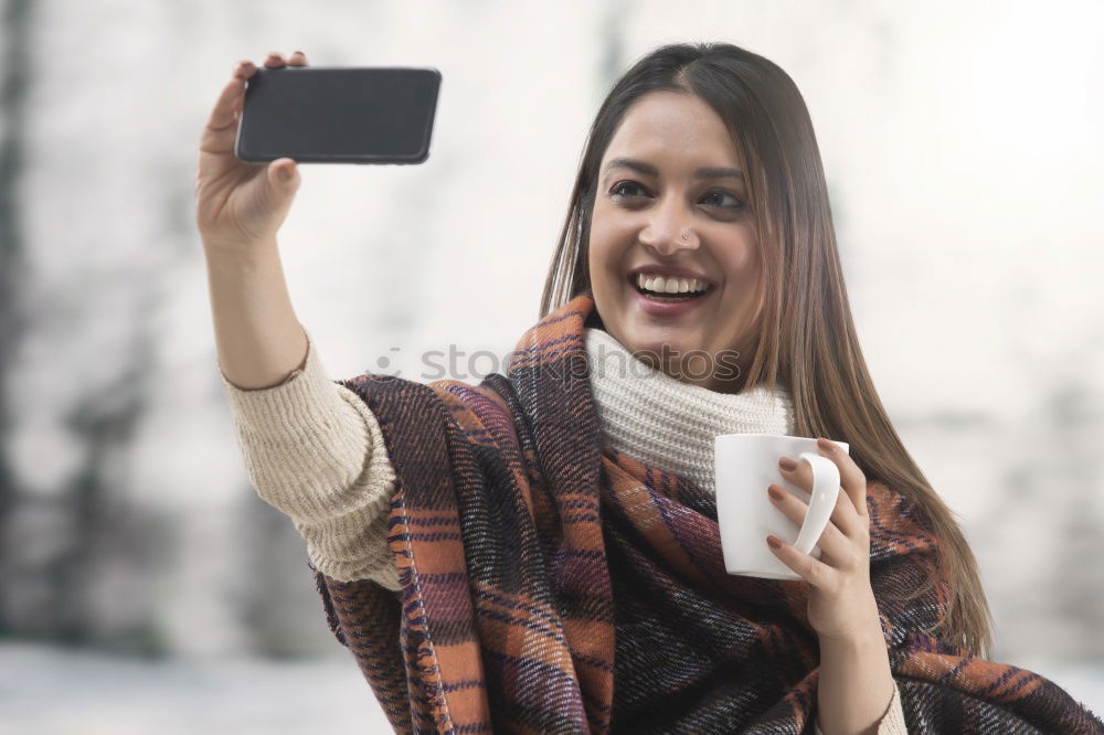 Image, Stock Photo Happy young woman with her mobile on the street