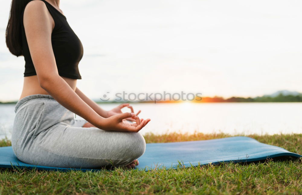 Similar – Image, Stock Photo Attractive woman working out on a wooden deck