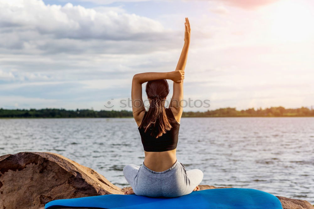 Similar – Image, Stock Photo Young beautiful woman doing yoga in nature