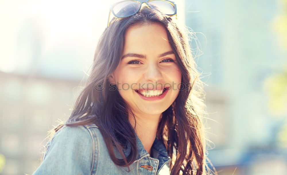 Similar – Close-up portrait of young woman with beautiful blue eyes