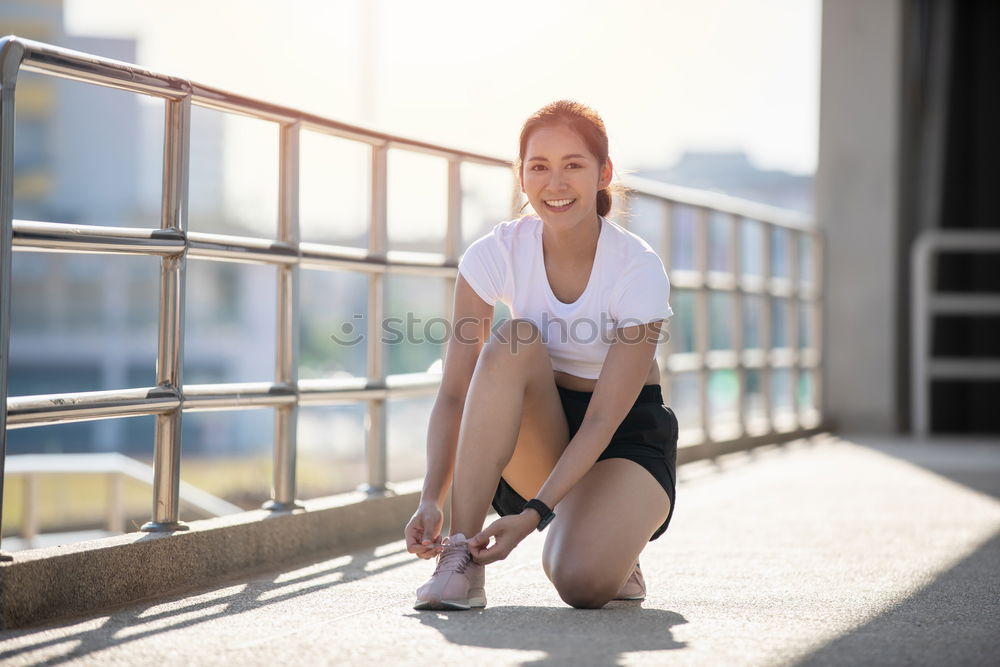 Similar – Image, Stock Photo Happy woman taking a break from jogging.