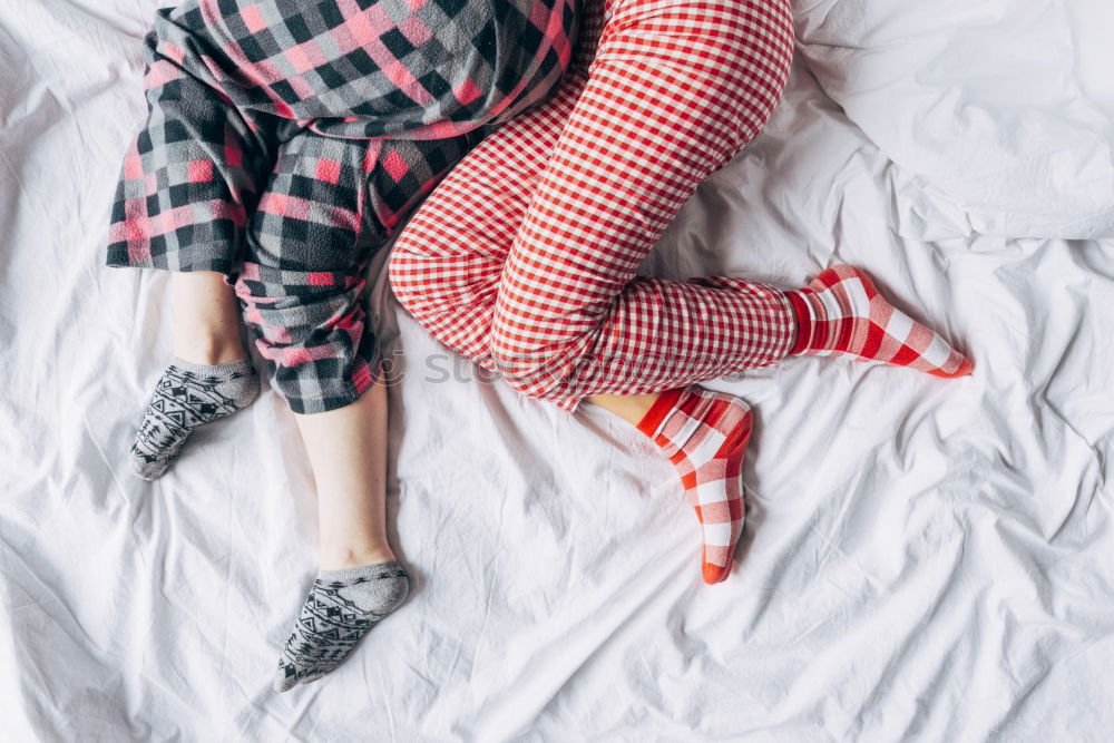 Similar – happy kid girl waking up in early morning in her room, lying in bed