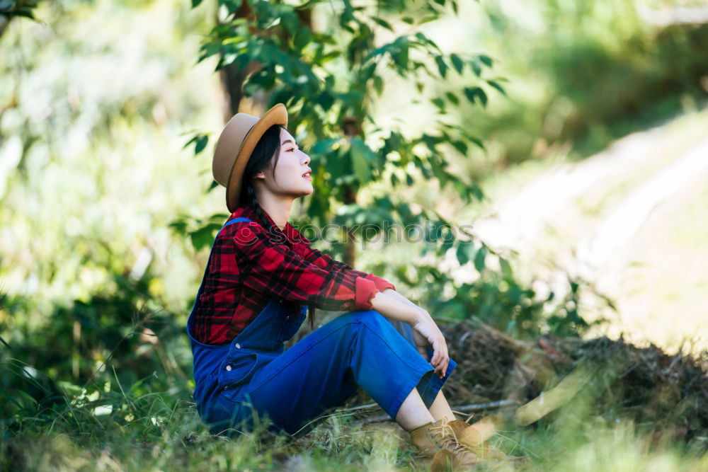 Similar – Sitting underneath a tree