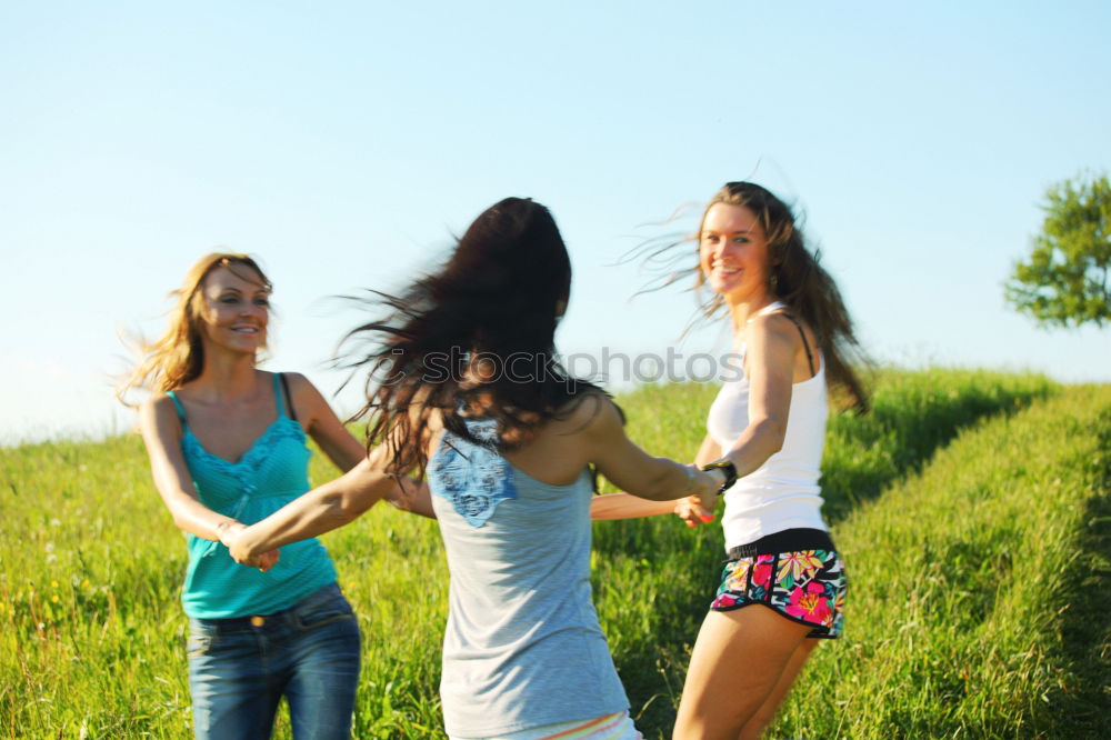 Similar – Beautiful women smiling and having fun and running.