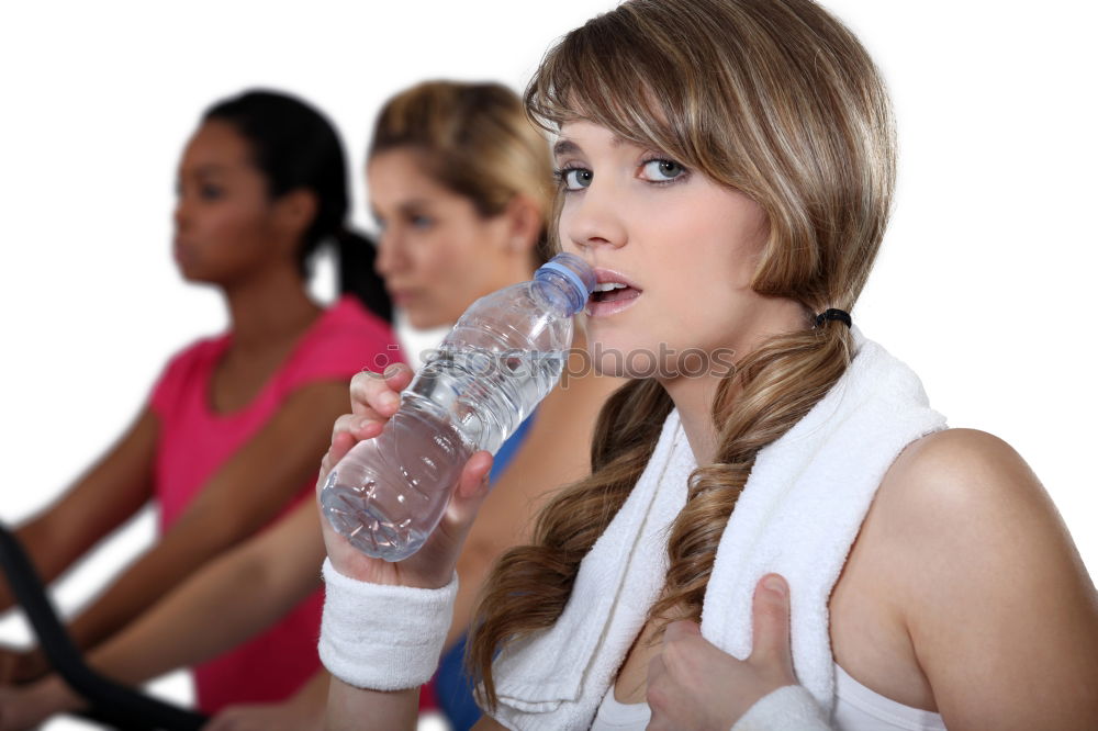 Similar – Athletic Women Drinking Water After an Exercise