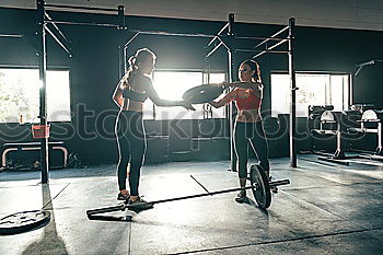 Similar – Image, Stock Photo People training in gym olimpic rings and chin bar