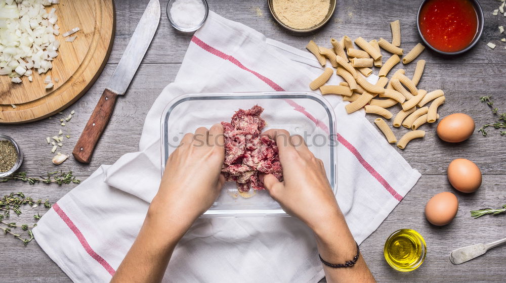 Similar – minced meat in an old mincer with herbs and spices