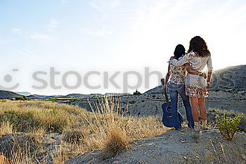 Similar – Happy women walking on hill