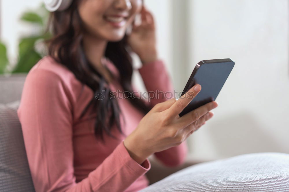 Similar – Happy caucasian women listening to music on smart phone