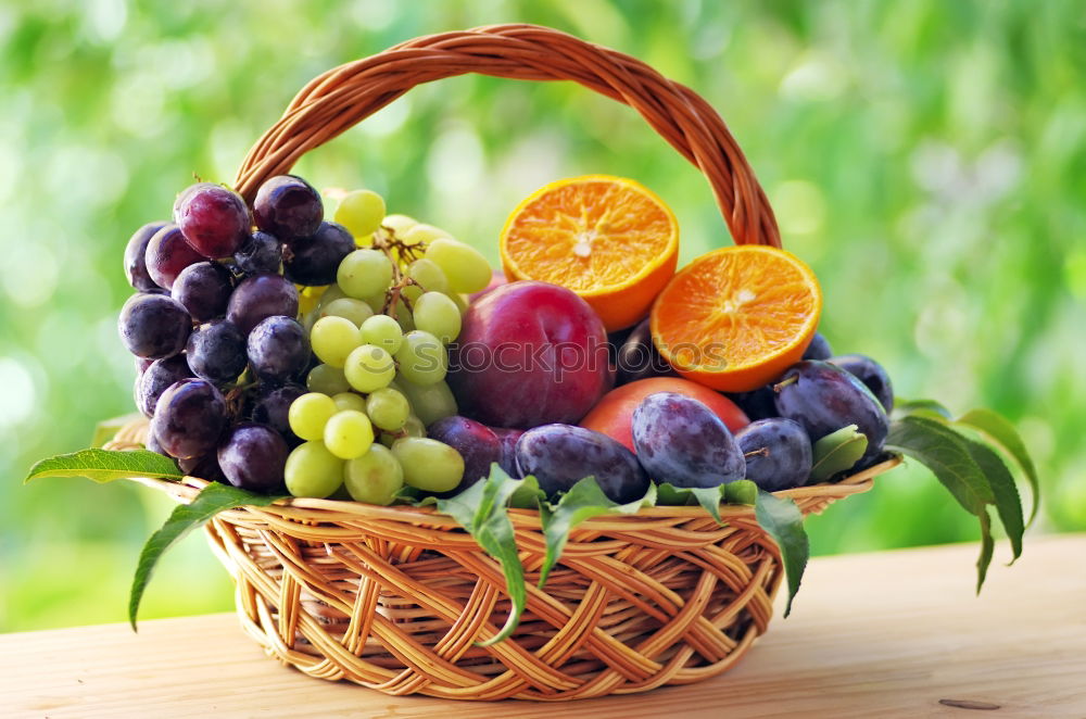 Similar – Image, Stock Photo Mirabelle plums, plums and grapes