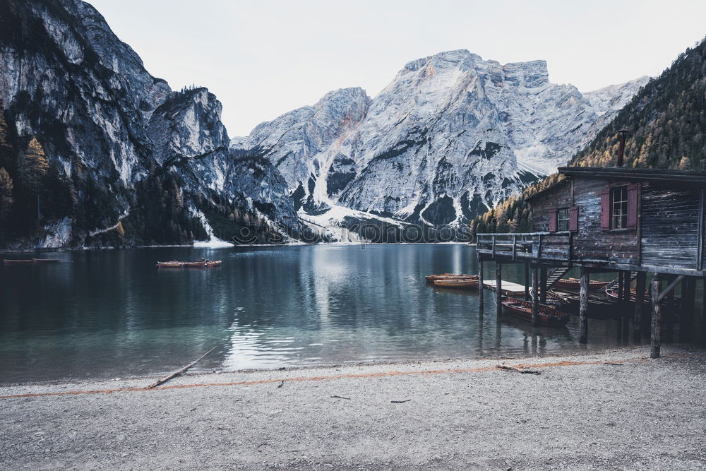 Wooden dock on lake in mountains