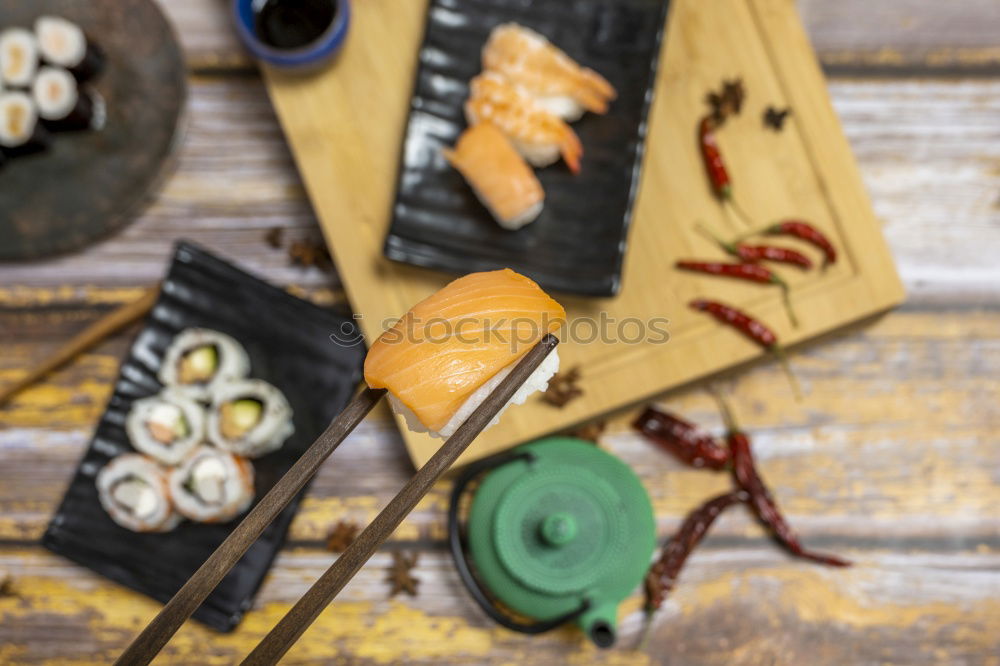 Similar – Geometric bowl of Asian Noodle Soup with chopsticks