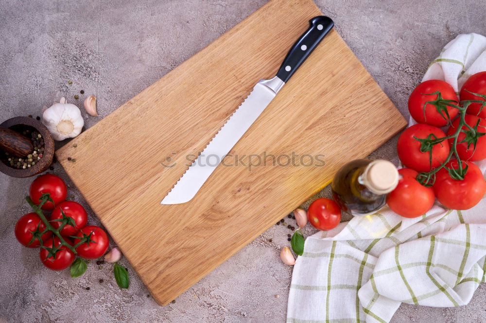 Image, Stock Photo cutting board with a knife and fresh red cherry tomatoes