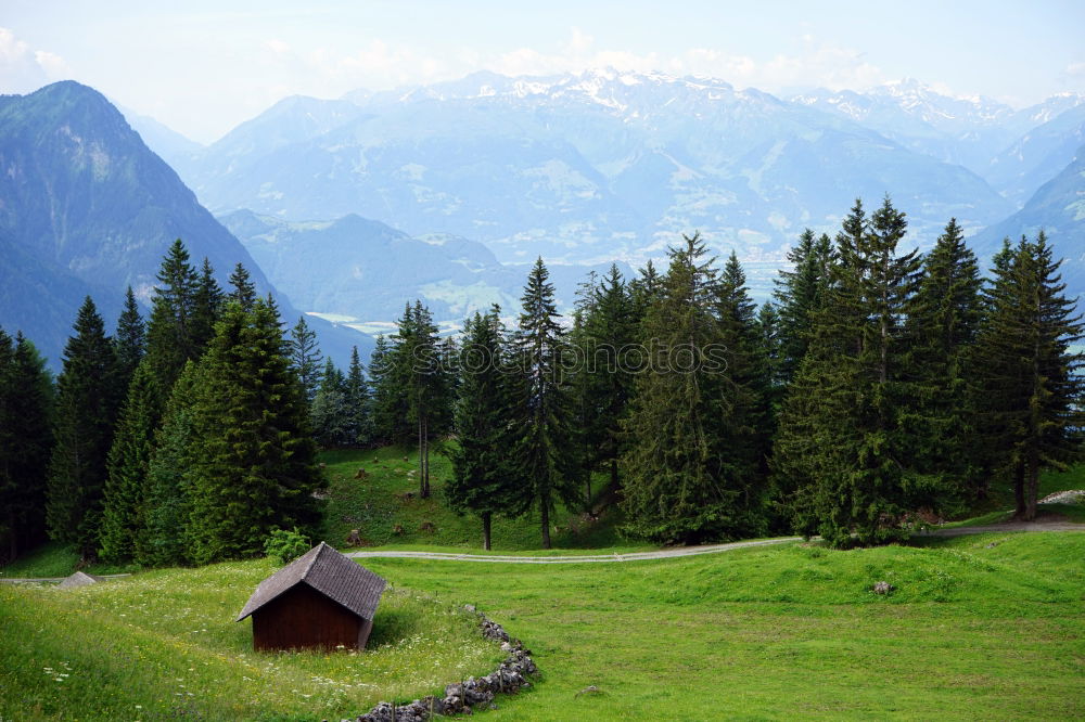 Similar – Typische Schweizer Hütte in den Berner Alpen mit dem Gipfel des Eiger im Hintergrund.