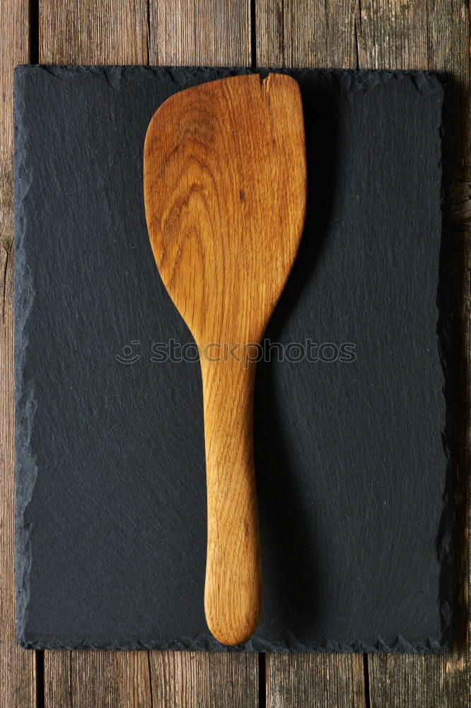 Similar – empty old brown wooden cutting board and spoon