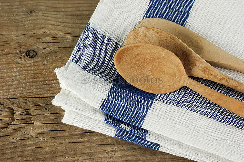 Old hatchet an a wooden cutting board, top view