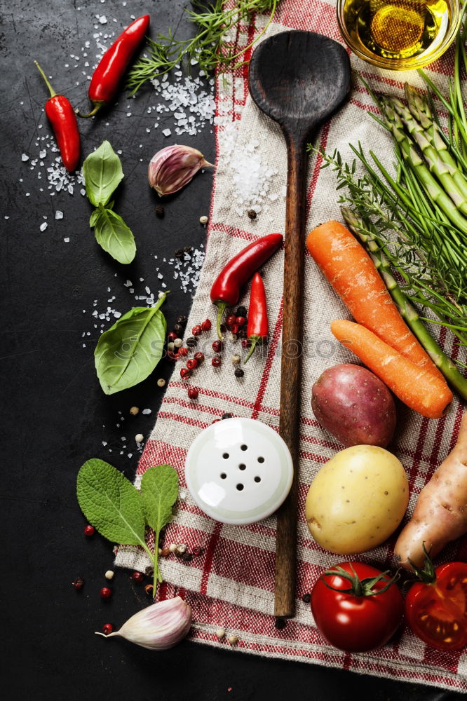 Similar – Image, Stock Photo Empty black frying pan and vegetables