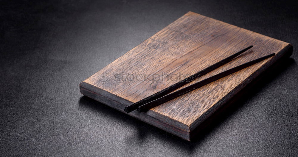 Similar – Wooden table and old cutting board, top view, copy space