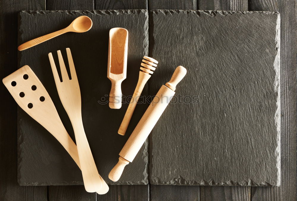 Similar – Empty grill pan with wooden spatula and spoon