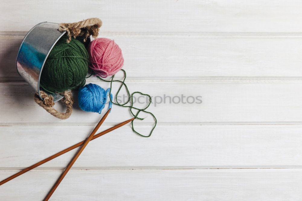 Similar – Image, Stock Photo Set of scattered sewing accessories on white wooden table