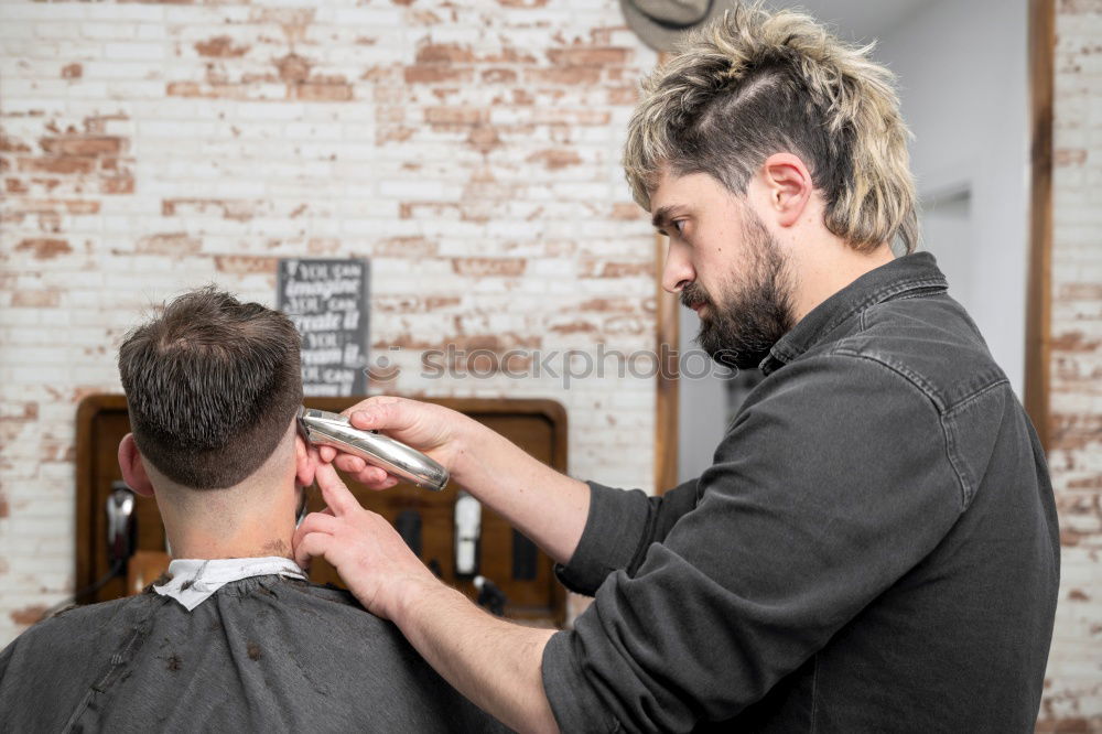 Similar – Barber doing face massage to man