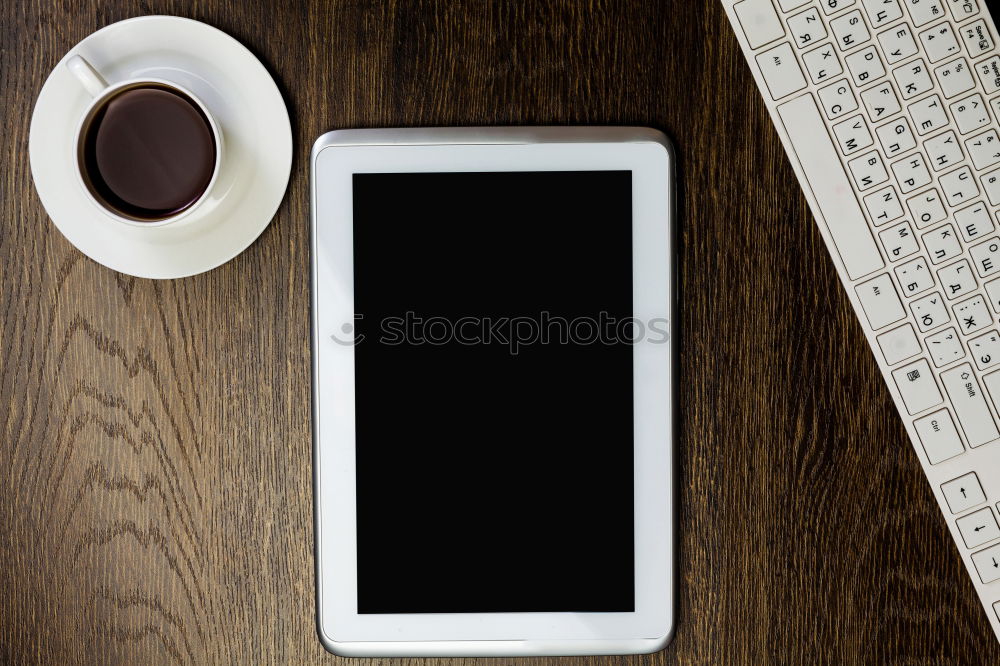 Similar – Image, Stock Photo keyboard and phone with black screen on wooden desk.