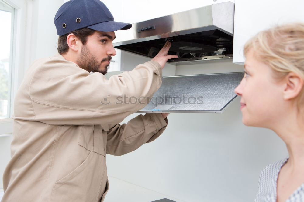 Similar – Image, Stock Photo Interracial couple painting a wardrobe