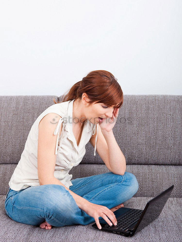 Similar – Image, Stock Photo Young womanbiting nails while sitting on a leather couch