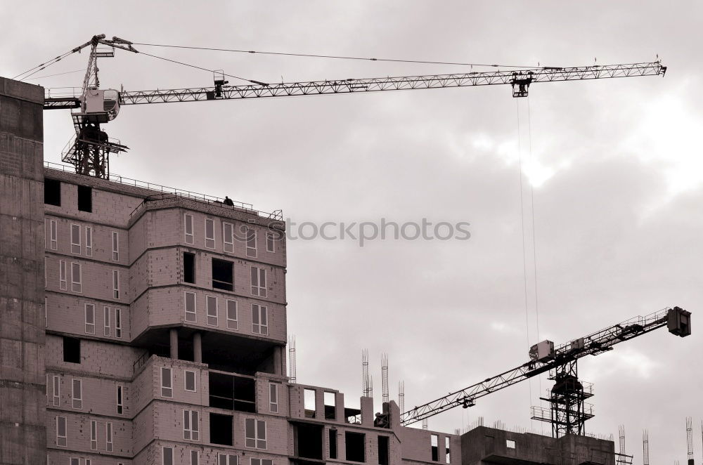 Similar – Kran und Hochhaus