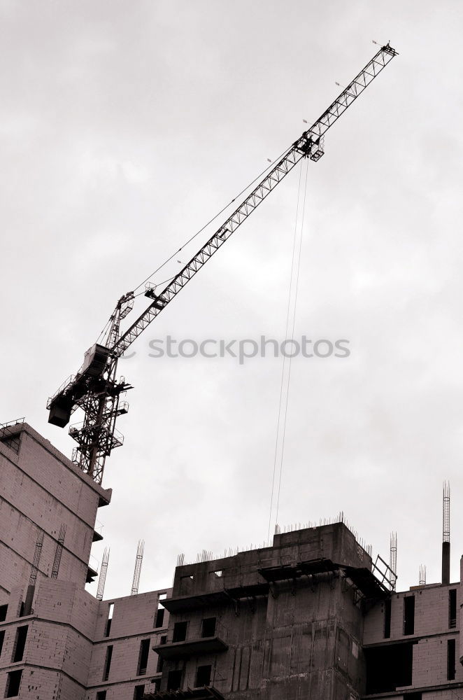 Similar – Kran und Hochhaus