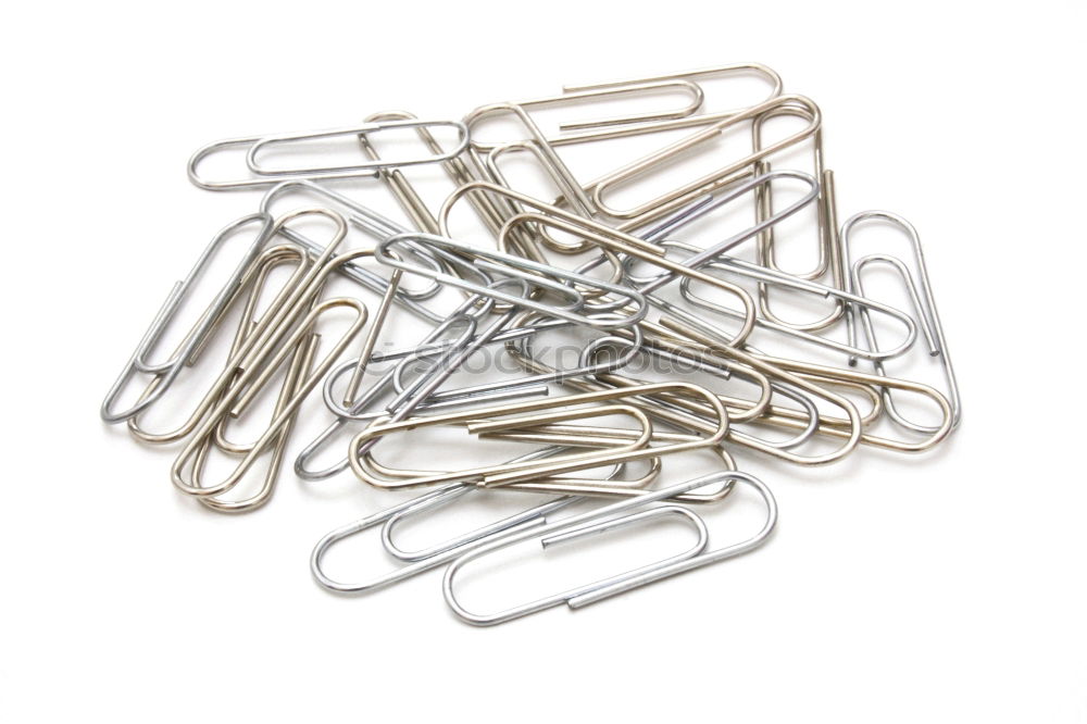 Similar – many paperclips on yellow background