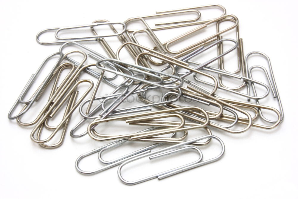 Similar – many paperclips on yellow background