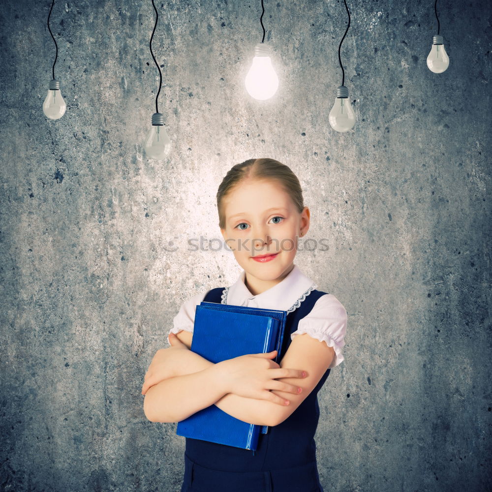 Image, Stock Photo Cute schoolgirl posing in a classroom