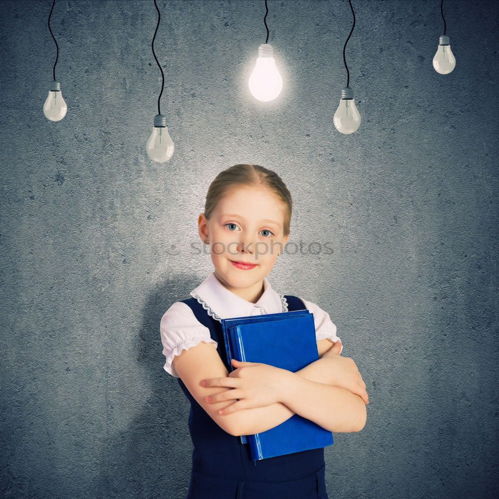 Similar – Image, Stock Photo Cute schoolgirl posing in a classroom