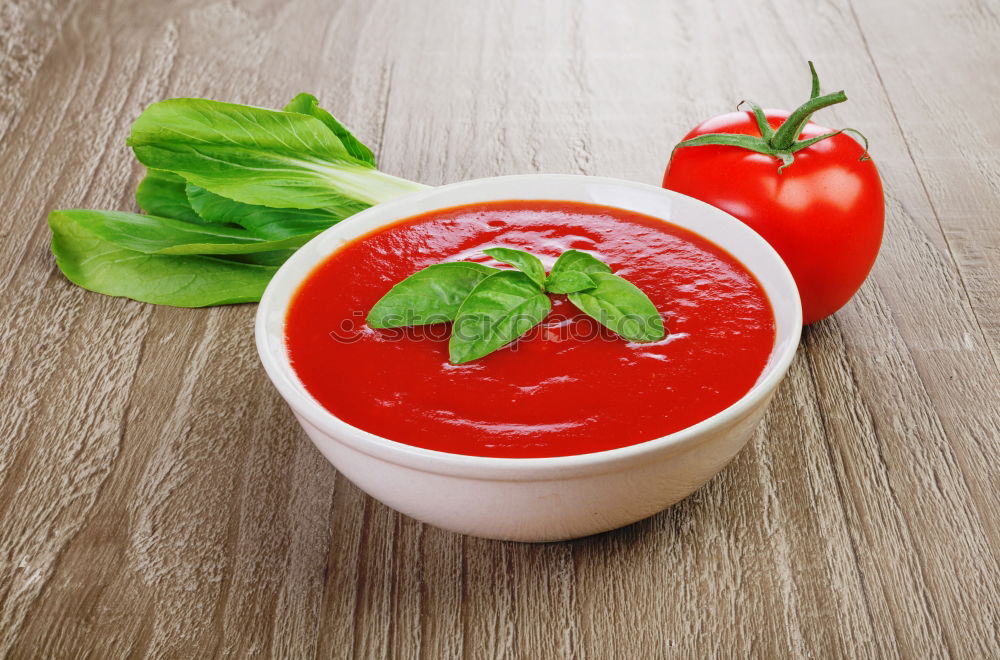 Similar – Fresh tomato soup with ingredients