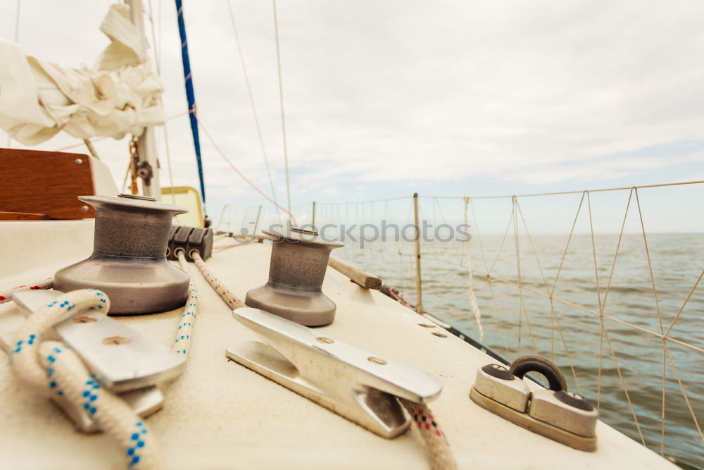 Similar – Fenders suspended between a boat and dockside for protection. Maritime fenders