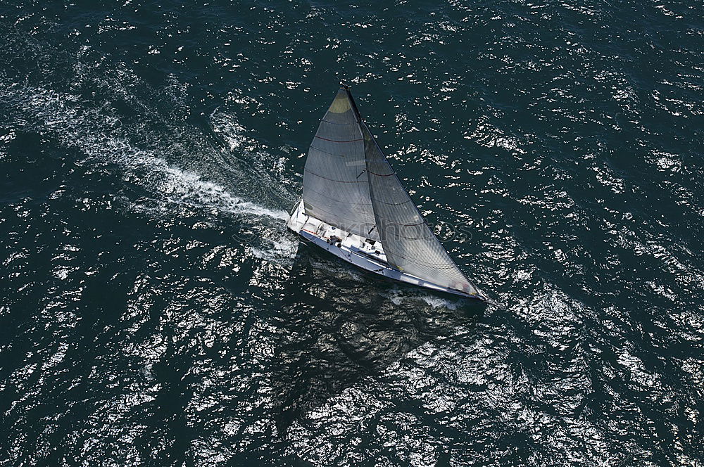 Similar – Sailing boat on blue Lake Garda II