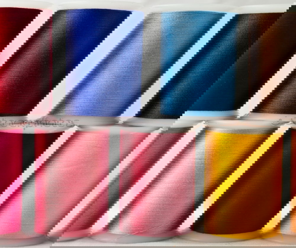 Similar – Image, Stock Photo Five old sewing thread thread rolls in pastel colours on wood