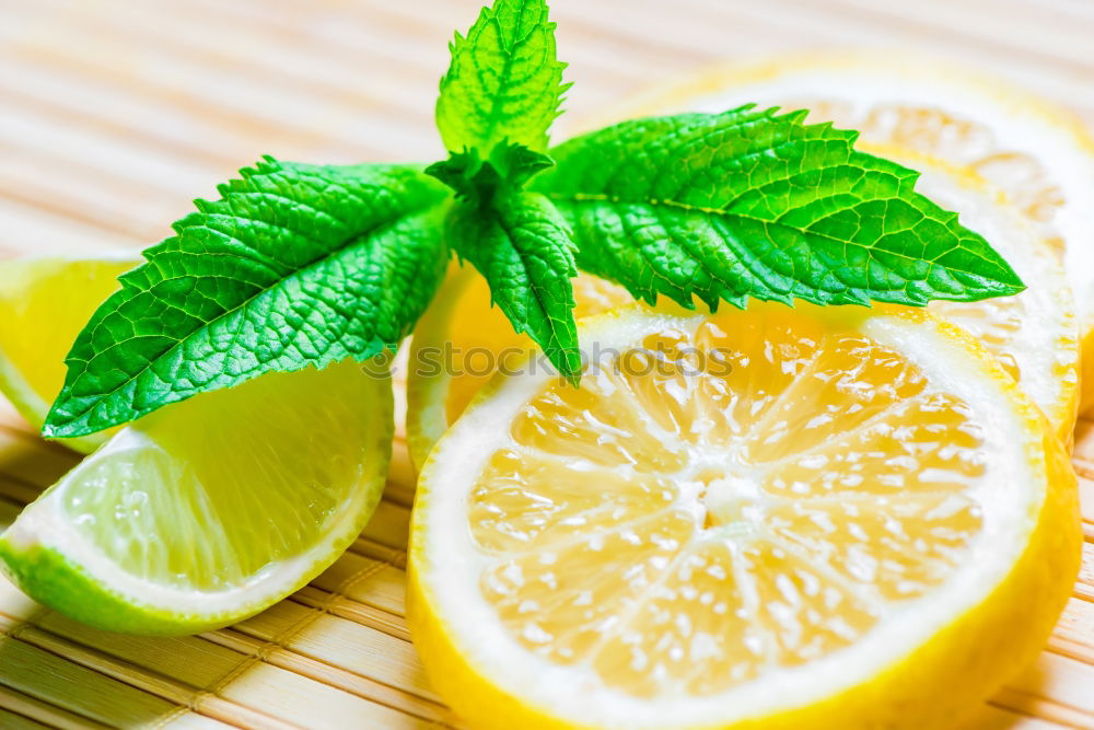 Similar – Image, Stock Photo ripe yellow lemons and lime, mint green