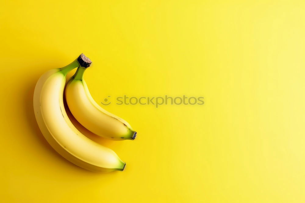 Jammy banana halves on yellow