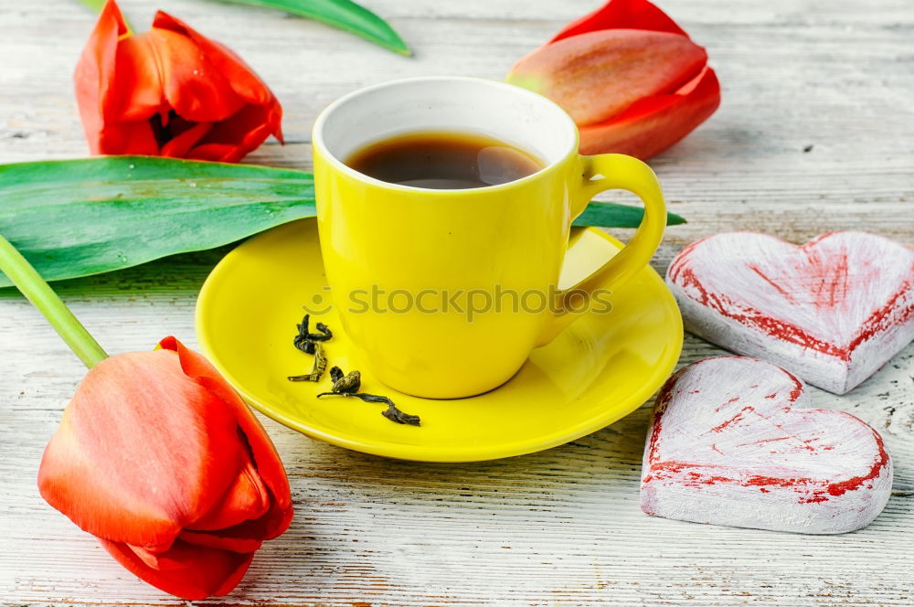 Similar – Tea cup with heart and falling colorful autumn leaves