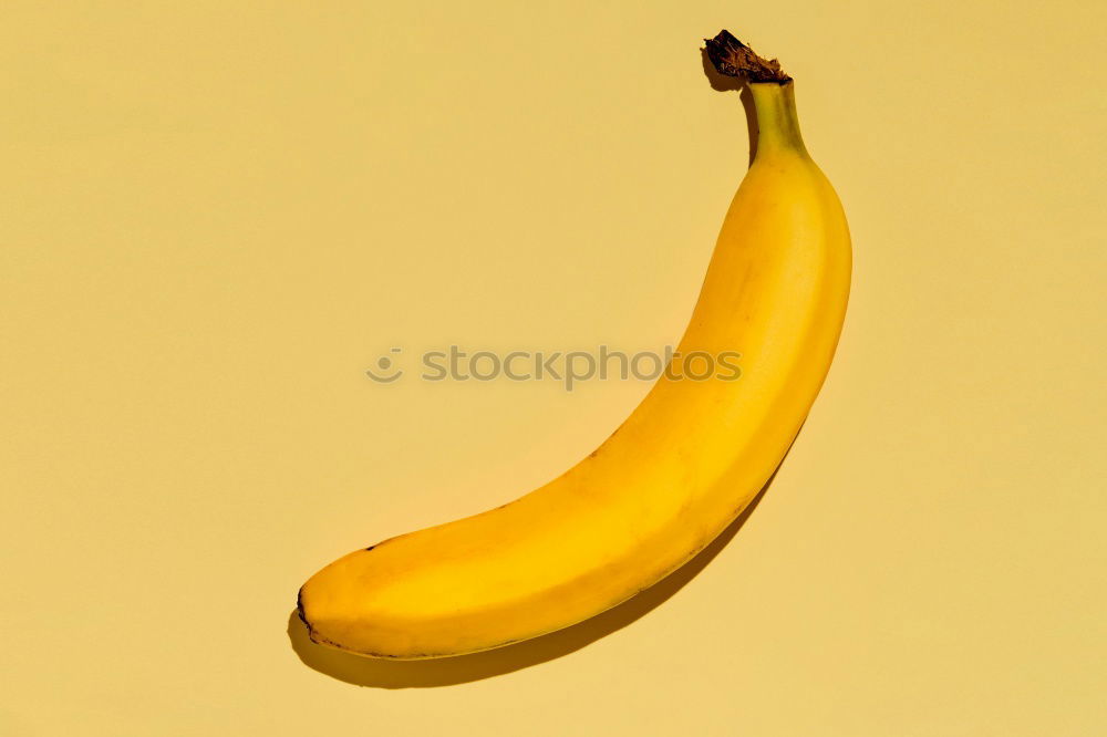 Similar – Jammy banana halves on yellow