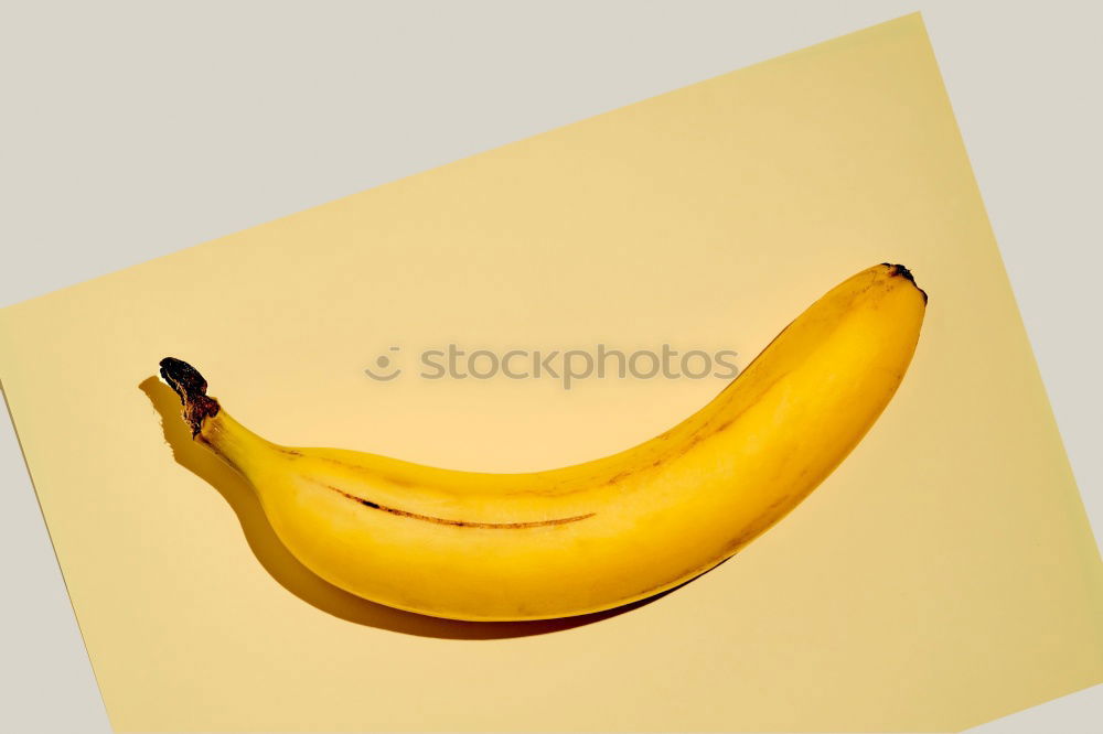 Similar – Jammy banana halves on yellow