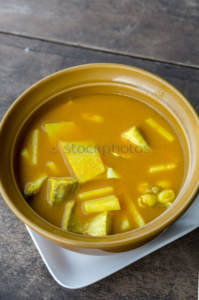 Similar – Image, Stock Photo Citrus juice in a glass on a dark table