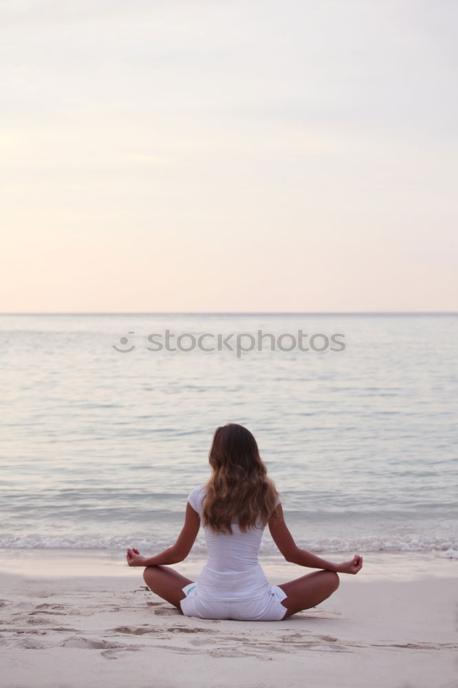 Similar – Image, Stock Photo Young woman practicing yoga by sea