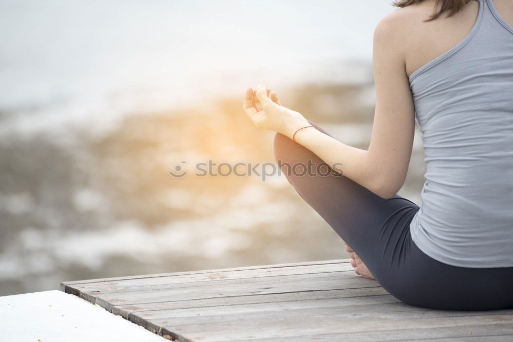 Similar – Image, Stock Photo Attractive woman working out on a wooden deck