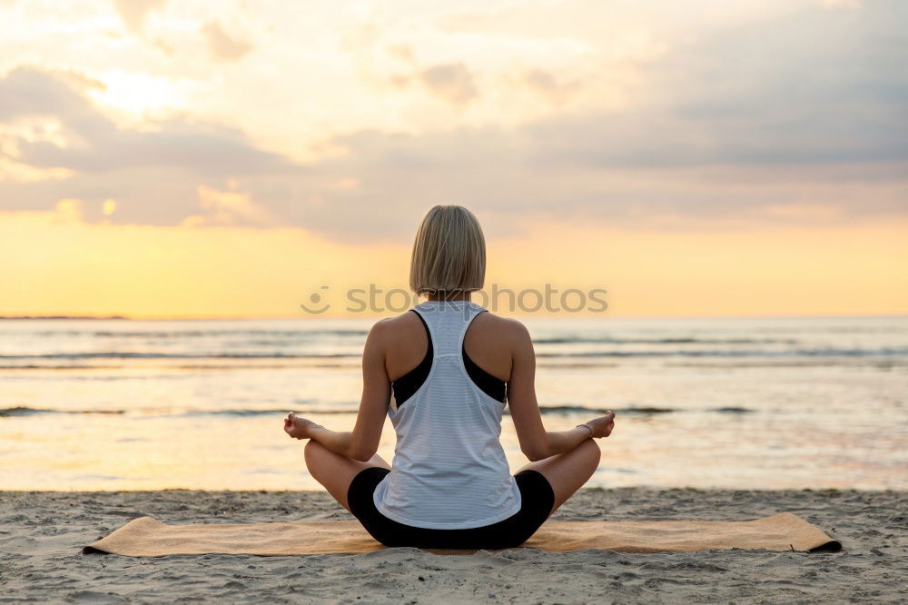 Image, Stock Photo Young woman practicing yoga by sea