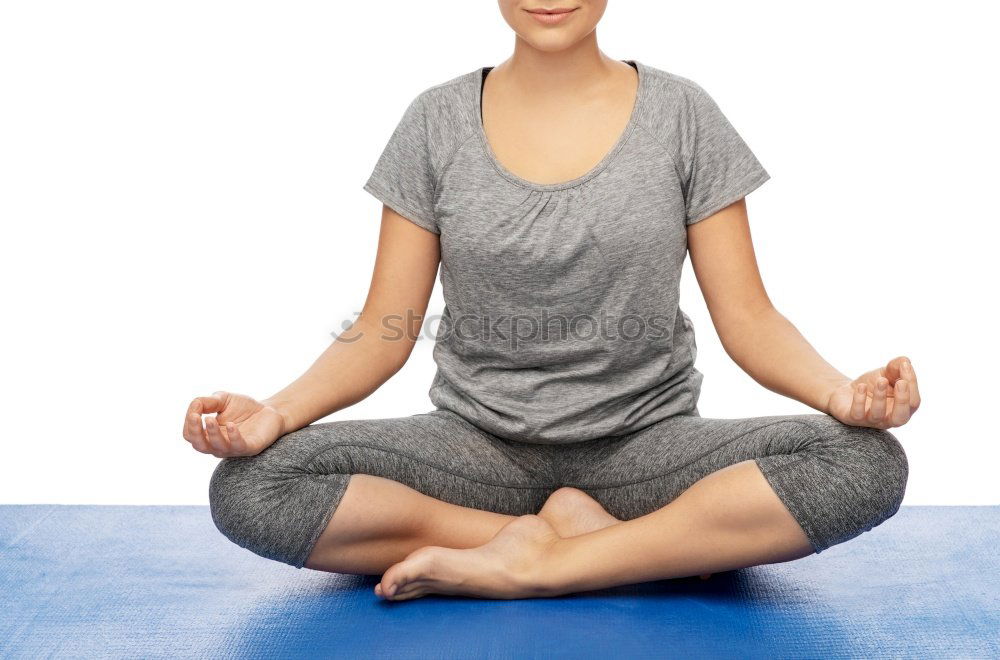 Anonymous man meditating during yoga training