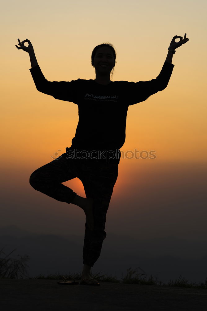 Similar – Man doing yoga in nature.